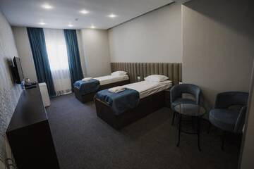 Фото номера Двухместный номер с 2 отдельными кроватями Отель Sleepers Avia Hotel DME г. Домодедово 4